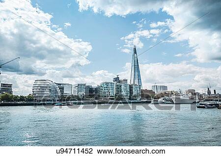 Waterfront cityscape of the Shard and Thames river, London, England, UK View Large Photo Image Stock Image - Waterfront cityscape of the Shard and Thames river, London, England, UK. Fotosearch