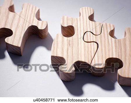 Wooden jigsaw pieces View Large Photo Image Stock Image - Wooden jigsaw pieces. Fotosearch