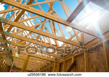 Stock Photograph - Wooden roof framing truss. Fotosearch