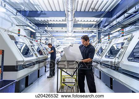 Workers in circuit board manufacturing factory View Large Photo Image Stock Image - Workers in circuit board manufacturing factory. Fotosearch