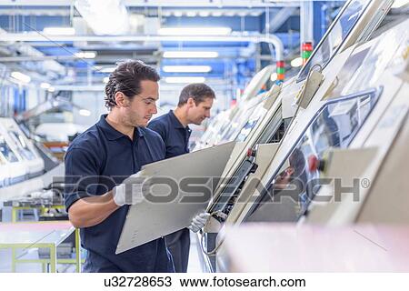 Workers in circuit board manufacturing factory View Large Photo Image Stock Image - Workers in circuit board manufacturing factory. Fotosearch