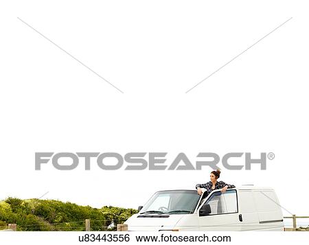 Young woman looking out from camper van, Point Addis, Anglesea, Victoria, Australia View Large Photo Image Stock Photograph - Young woman looking out from camper van, Point Addis, Anglesea, Victoria, Australia. Fotosearch
