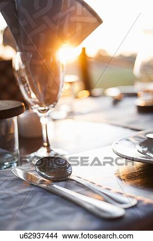 Close up of sunset dining table at safari lodge, Kafue National Park, Zambia View Large Photo Image Picture - Close up of sunset dining table at safari lodge, Kafue National Park, Zambia. Fotosearch