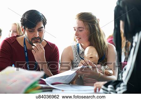 Stock Image - College students in Childcare class. Fotosearch