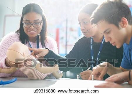 Stock Image - College students in Childcare class. Fotosearch