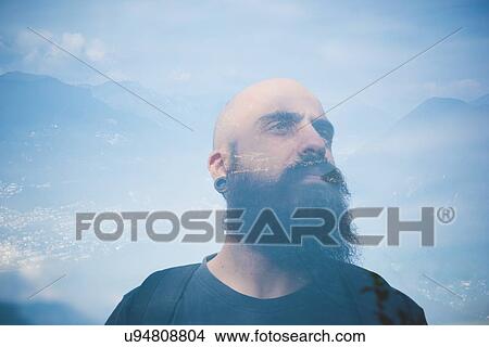 Double exposure of mid adult man at Lake Lugano, Switzerland View Large Photo Image Picture - Double exposure of mid adult man at Lake Lugano, Switzerland. Fotosearch