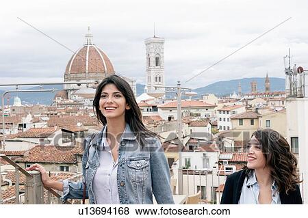 Lesbian couple in front of Giotto's Campanile and Florence Cathedral, Tuscany, Italy View Large Photo Image Stock Photo - Lesbian couple in front of Giotto's Campanile and Florence Cathedral, Tuscany, Italy. Fotosearch