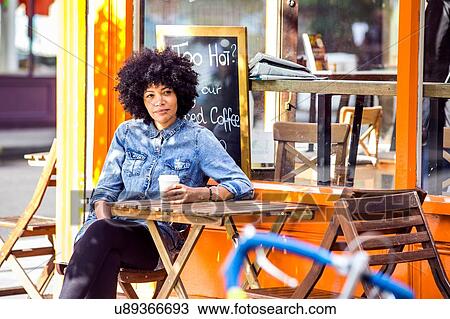 Mature woman drinking takeaway coffee and sidewalk cafe View Large Photo Image Stock Image - Mature woman drinking takeaway coffee and sidewalk cafe. Fotosearch