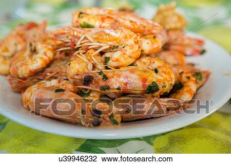 Plate of fried prawns and herbs View Large Photo Image Stock Image - Plate of fried prawns and herbs. Fotosearch