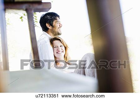 Stock Image - Portrait of happy couple. Fotosearch