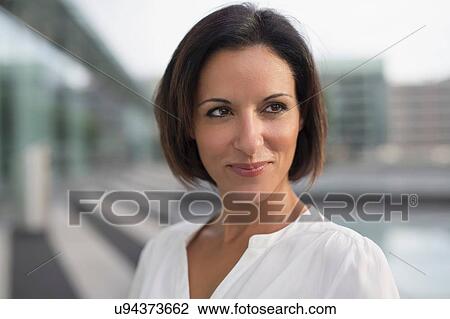 Portrait of mature businesswoman outside airport View Large Photo Image Stock Image - Portrait of mature businesswoman outside airport. Fotosearch