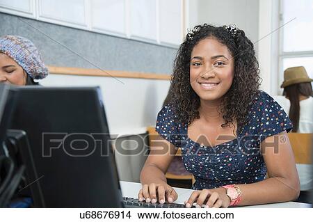 Portrait of teenage girl in high school computer class View Large Photo Image Picture - Portrait of teenage girl in high school computer class. Fotosearch