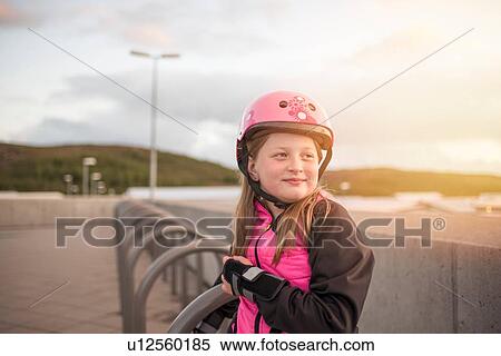 Portrait of young girl wearing protective helmet View Large Photo Image Stock Photography - Portrait of young girl wearing protective helmet. Fotosearch