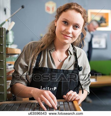 Portrait of young woman with letterpress tray in print workshop View Large Photo Image Stock Image - Portrait of young woman with letterpress tray in print workshop. Fotosearch