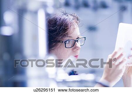 Technician working in laboratory View Large Photo Image Stock Image - Technician working in laboratory. Fotosearch