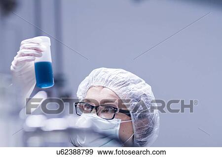 Technician working in laboratory View Large Photo Image Stock Photo - Technician working in laboratory. Fotosearch