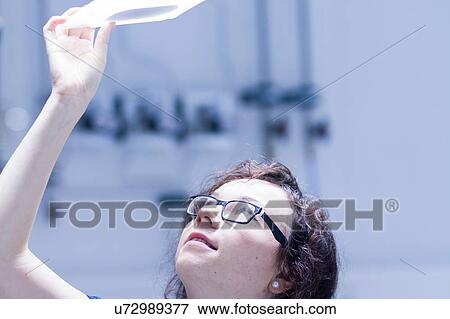 Stock Photo - Technician working in laboratory. Fotosearch