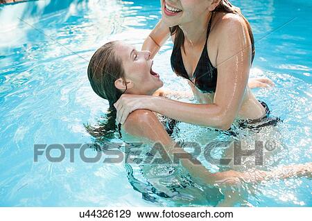 teenage girls swimming