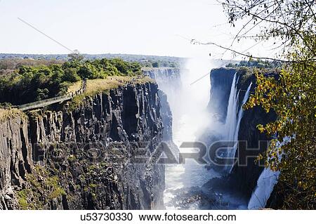 View of Victoria Falls, Zambia View Large Photo Image Stock Image - View of Victoria Falls, Zambia. Fotosearch