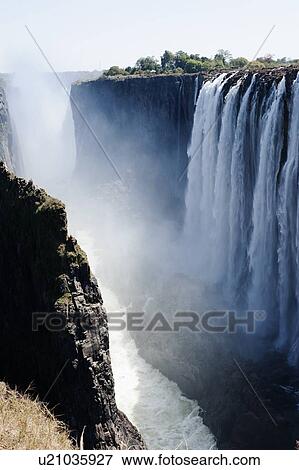 View of Victoria Falls, Zambia View Large Photo Image Stock Photo - View of Victoria Falls, Zambia. Fotosearch