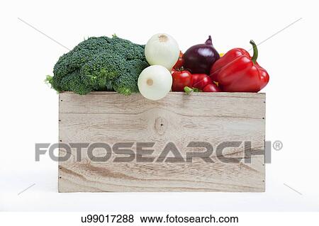 Stock Photo - Wood crate filled with fresh vegetables. Fotosearch