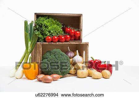 Wood crates filled with fresh vegetables View Large Photo Image Picture - Wood crates filled with fresh vegetables. Fotosearch