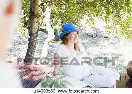 Young woman relaxing at safari lodge, Kafue National Park, Zambia View Large Photo Image Stock Image - Young woman relaxing at safari lodge, Kafue National Park, Zambia. Fotosearch