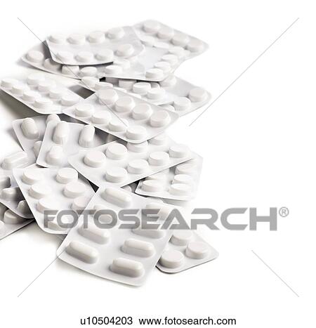 Drawing - Blister packs containing various tablets against a white background.. Fotosearch