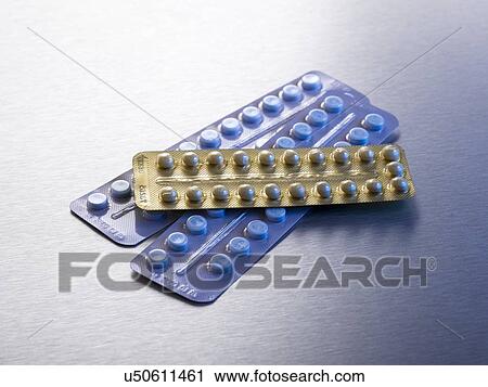 Contraceptive pills in blister packs, studio shot. View Large Illustration Clip Art - Contraceptive pills in blister packs, studio shot.. Fotosearch