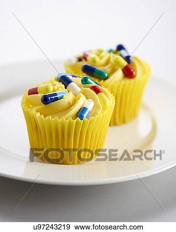 Diet pills, conceptual image. Cup cakes with capsules on the top. View Large Illustration Stock Illustration - Diet pills, conceptual image. Cup cakes with capsules on the top.. Fotosearch
