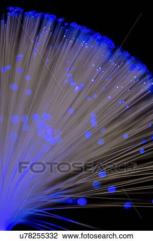 Fibre optics against a black background. View Large Illustration Drawing - Fibre optics against a black background.. Fotosearch