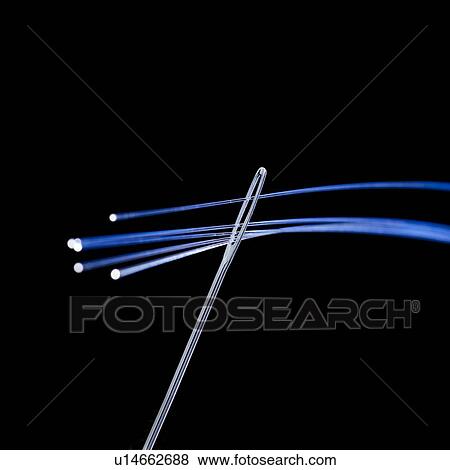 Fibre optics being thread through a needle, close up. View Large Illustration Stock Illustration - Fibre optics being thread through a needle, close up.. Fotosearch