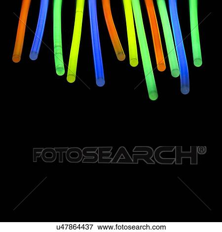Glow sticks against a black background. View Large Illustration Stock Illustration - Glow sticks against a black background.. Fotosearch