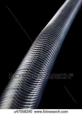 Longitudinal wave in a slinky spring. In longitudinal (or compression) waves the displacement is along the axis of propagation. View Large Illustration Clipart - Longitudinal wave in a slinky spring. In longitudinal (or compression) waves the displacement is along the axis of propagation.. Fotosearch