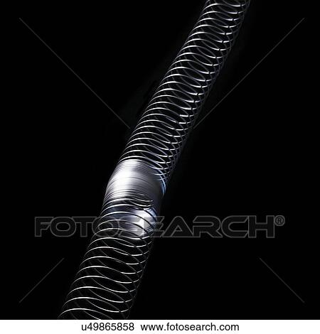 Stock Illustration - Longitudinal wave in a slinky spring. In longitudinal (or compression) waves the displacement is along the axis of propagation.. Fotosearch