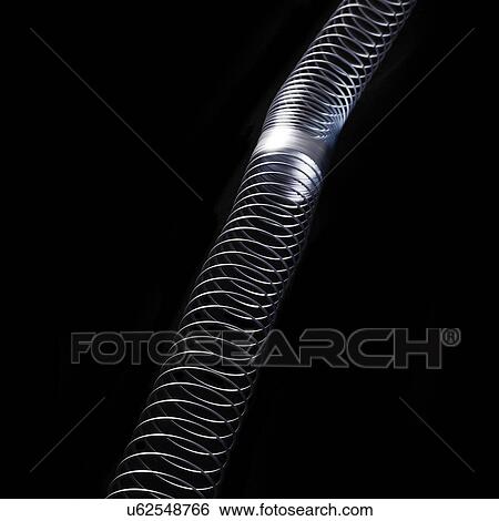 Longitudinal wave in a slinky spring. In longitudinal (or compression) waves the displacement is along the axis of propagation. View Large Illustration Stock Illustration - Longitudinal wave in a slinky spring. In longitudinal (or compression) waves the displacement is along the axis of propagation.. Fotosearch