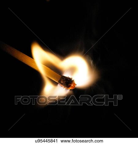 Matchstick on fire against a black background. View Large Illustration Clip Art - Matchstick on fire against a black background.. Fotosearch