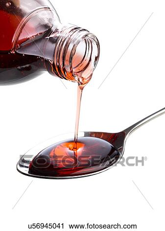 Clip Art - Medicine being poured onto a spoon against a white background.. Fotosearch