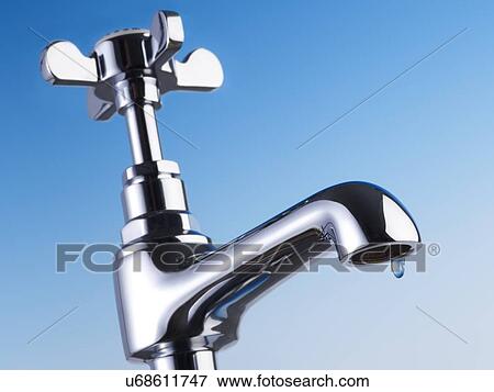 Stock Illustration - Metal tap against a blue background.. Fotosearch