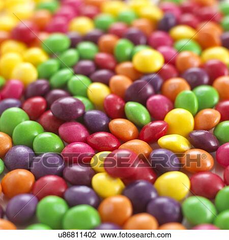 Multicoloured sweets. View Large Illustration Drawing - Multicoloured sweets.. Fotosearch