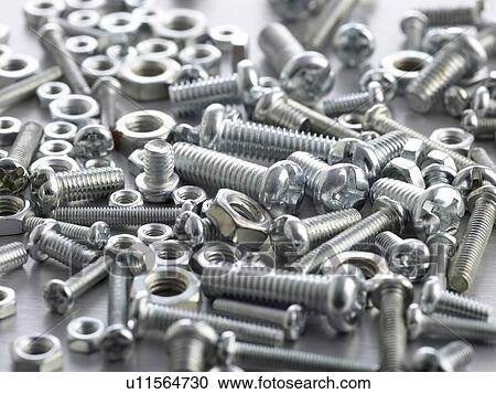 Nuts and bolts, close up. View Large Illustration Clipart - Nuts and bolts, close up.. Fotosearch