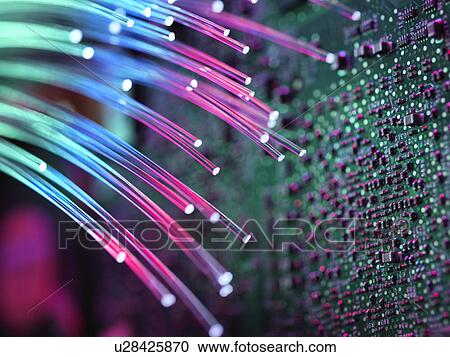 Clipart - PROPERTY RELEASED. Fibre optics carrying data passing a computer circuit board.. Fotosearch