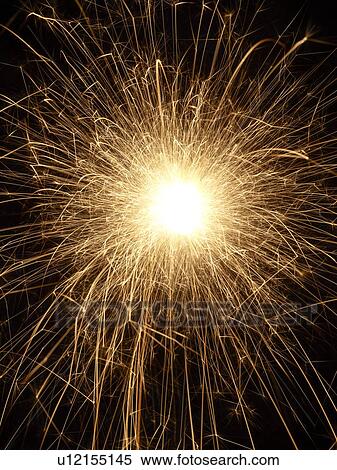 Sparkler and sparks, close up. View Large Illustration Stock Illustration - Sparkler and sparks, close up.. Fotosearch