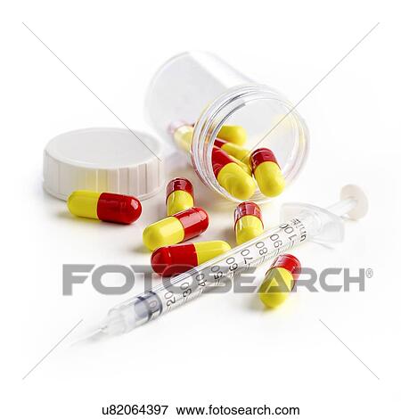 Syringe and capsules against a white background. View Large Illustration Stock Illustration - Syringe and capsules against a white background.. Fotosearch