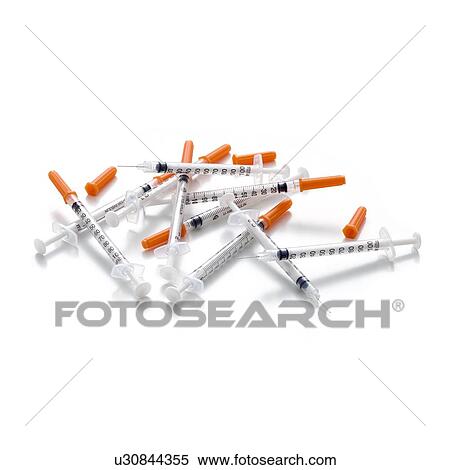 Syringes against a white background. View Large Illustration Stock Illustration - Syringes against a white background.. Fotosearch