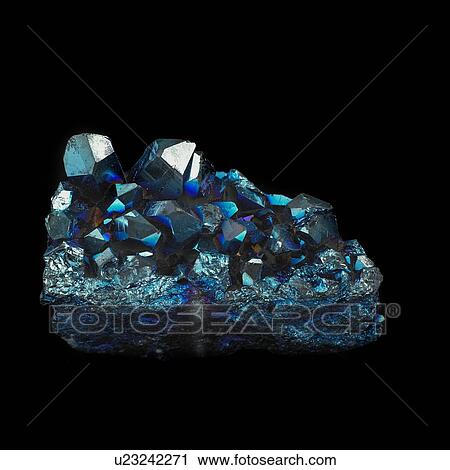 Titanium quartz against a black background. These quartz crystals have been coated with titanium to make them iridescent. View Large Illustration Clip Art - Titanium quartz against a black background. These quartz crystals have been coated with titanium to make them iridescent.. Fotosearch