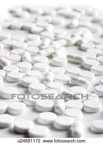 Drawing - White pills, close up.. Fotosearch
