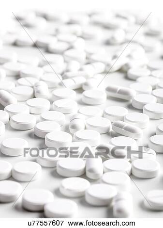 Stock Illustration - White pills, close up.. Fotosearch