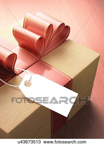Wooden gift box with red bow and blank gift tag. View Large Illustration Drawing - Wooden gift box with red bow and blank gift tag.. Fotosearch