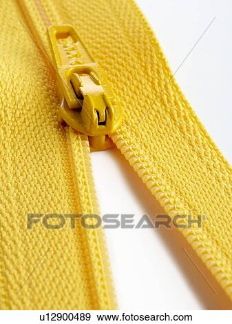 Yellow zip, close up. View Large Illustration Stock Illustration - Yellow zip, close up.. Fotosearch